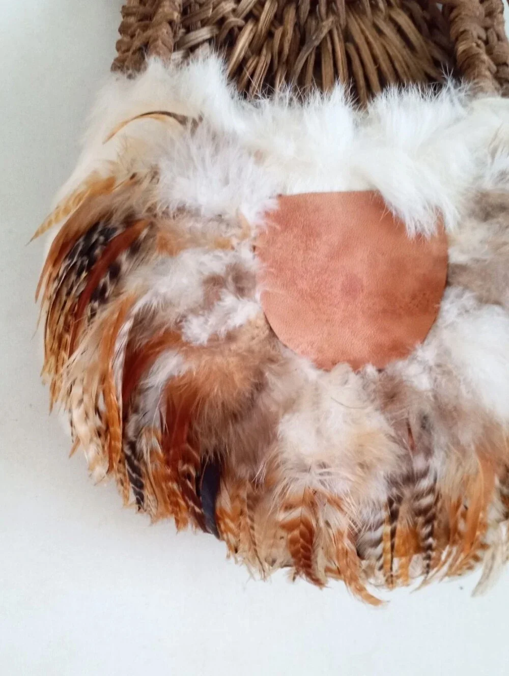 Indigenous Native American vintage natural wicker and feather wall basket
